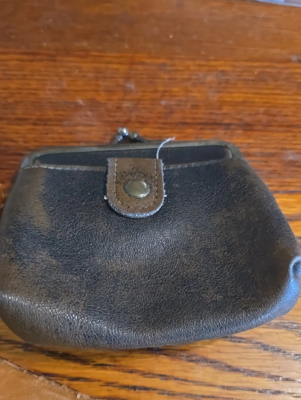 Source Unknown compact leather